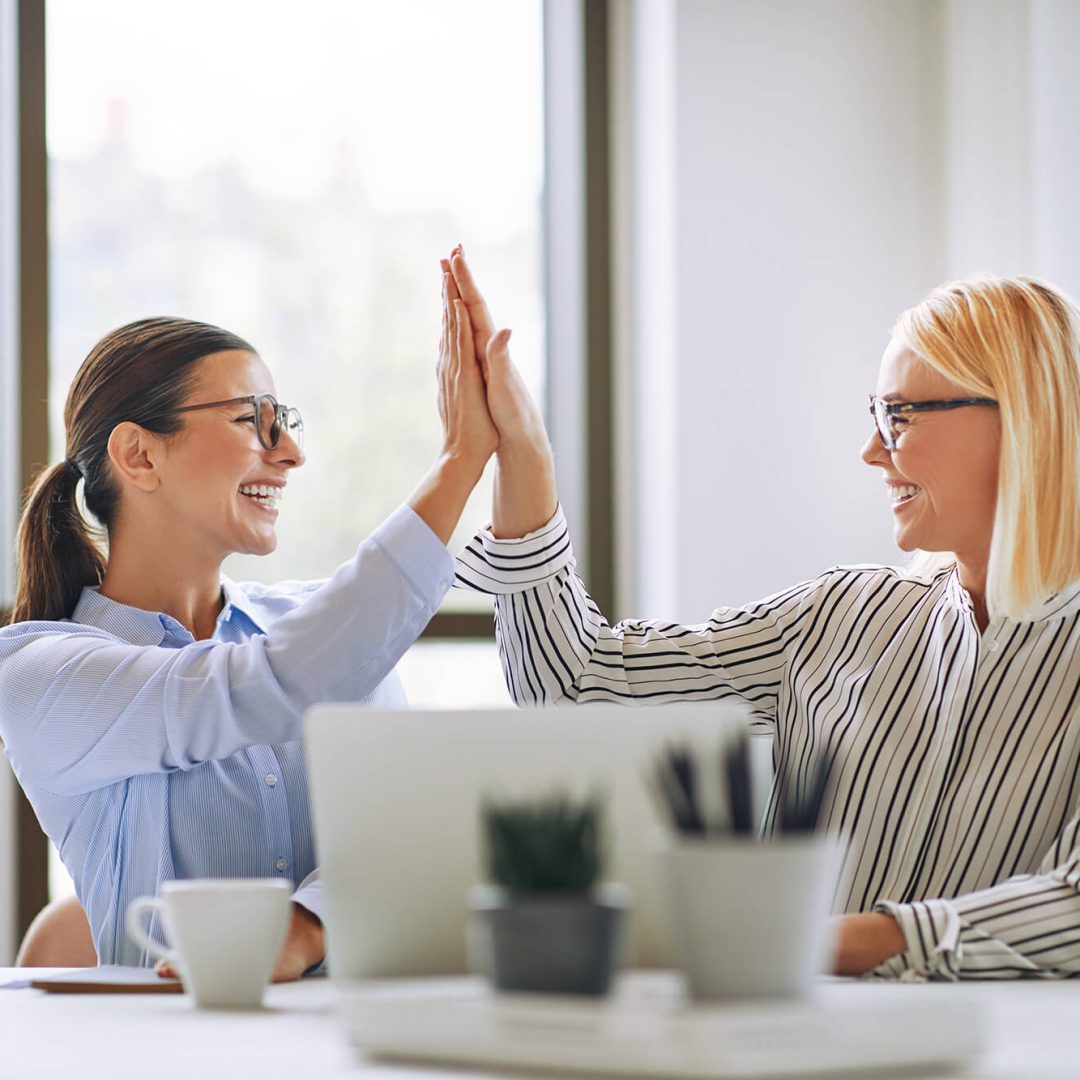 two-smiling-businesswomen-high-fiving-together-in-DDNACN5-1.jpg two-smiling-businesswomen-high-fiving-together-in-DDNACN5-1.jpg
